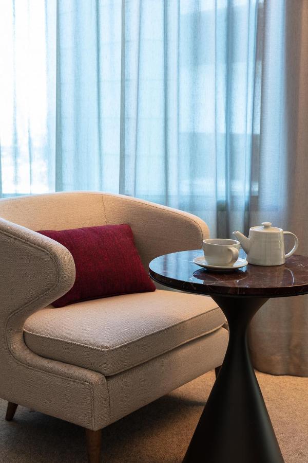 Next Hotel Melbourne, Curio Collection By Hilton Exteriér fotografie A tea set